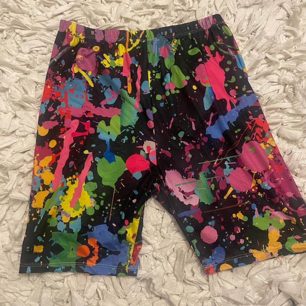 Vibrant Multi-Colored Bike Shorts with Paint Splatter Design